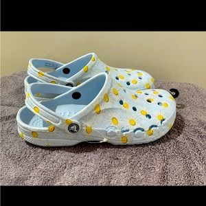 Daisy Crocs, light blue color 
size W-10 M-8